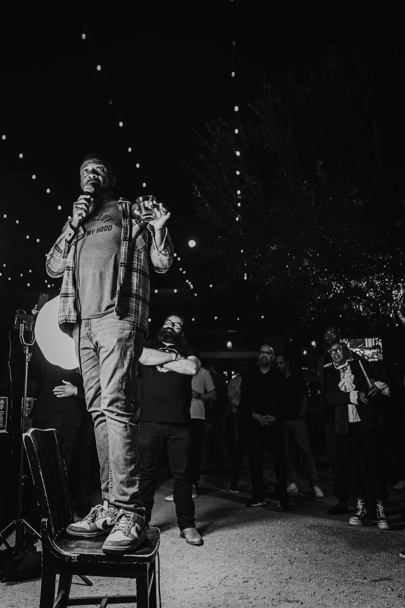 A performer on the mic at the first Hangout